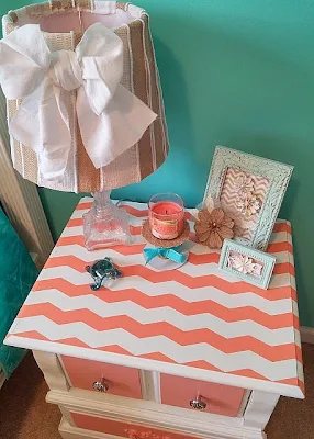 Learn how easy it is to add chevron stripes to a painted dresser or nightstand! You can find the tutorial at DIY beautify.
