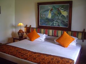 A BEAUTIFUL ROOM AT THE ANOM--JUST OPEN THE CARVED, WOODEN DOUBLE DOORS FOR VIEWS OF PARADISE