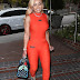 Blac Chyna flaunts curves in skintight orange jumpsuit after demanding Ryan Seacrest deposition