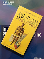 The Human Body, by Isaac Asimov, superimposed on Intermediate Physics for Medicine and Biology.