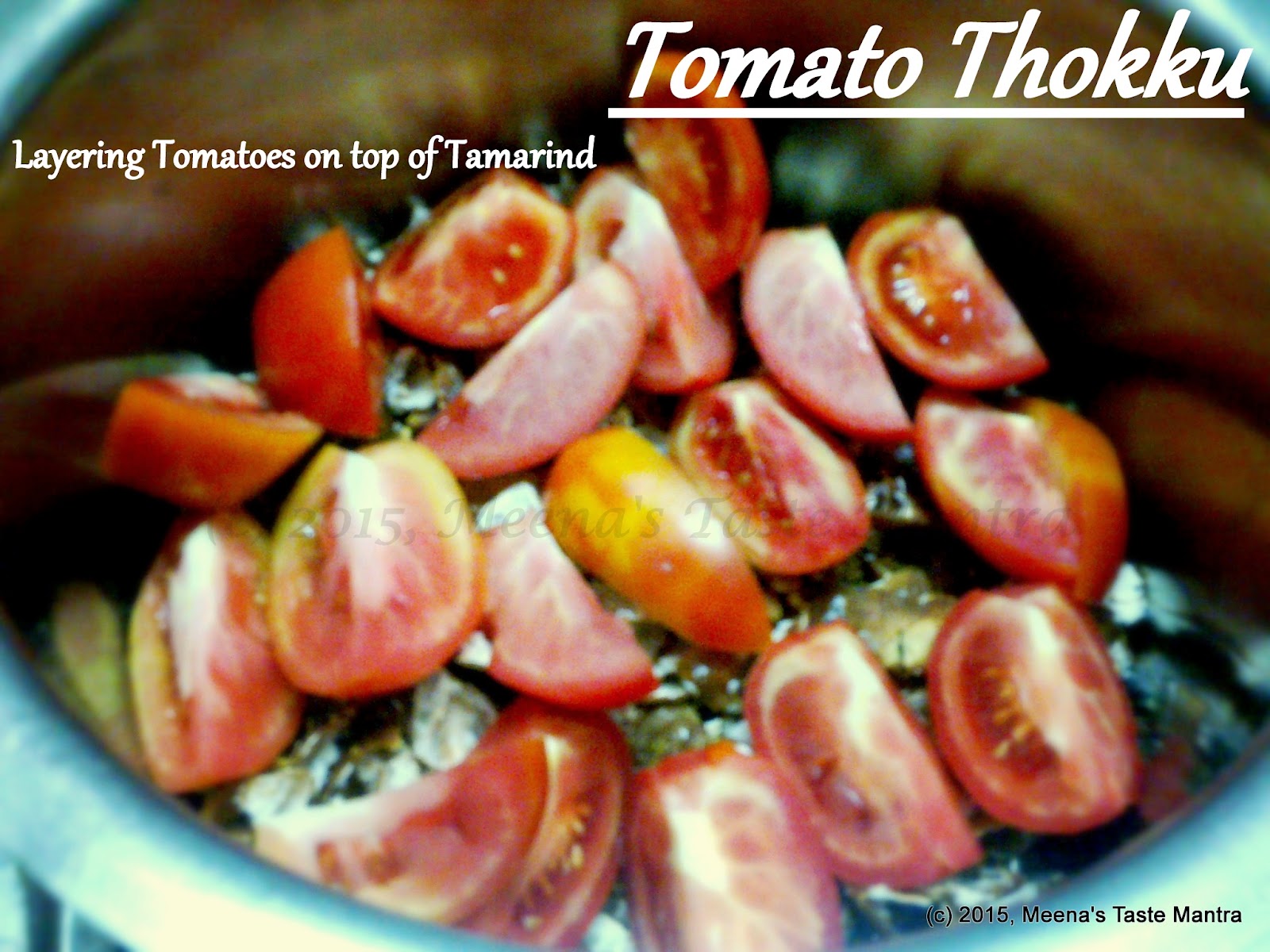 Tomato Thokku - Tomatoes layered on top of cleaned Tamarind