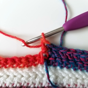 How to make a tidy color change across a row when picking up a new color from below in crochet