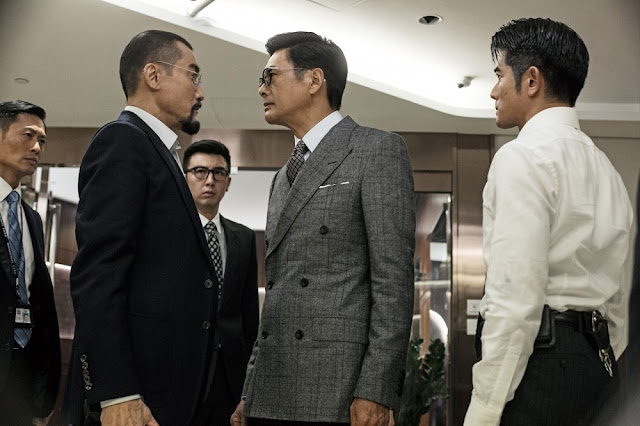 New addition Chow Yun Fat standing in between the lead actors Tony Leung and Aaron Kwok. Tony Leung Chow Yun Fatt Aaron Kwon Cold War 2 movie still