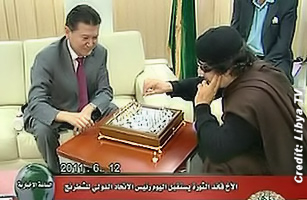 Libyan Lleader Moammar Gaddafi Playing Chess with  Kirsan Ilyumzhinov