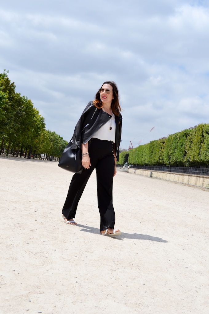 Vancouver fashion blogger Covet and Acquire in Paris Jardin des Tuileries H&M Icons leather jacket.