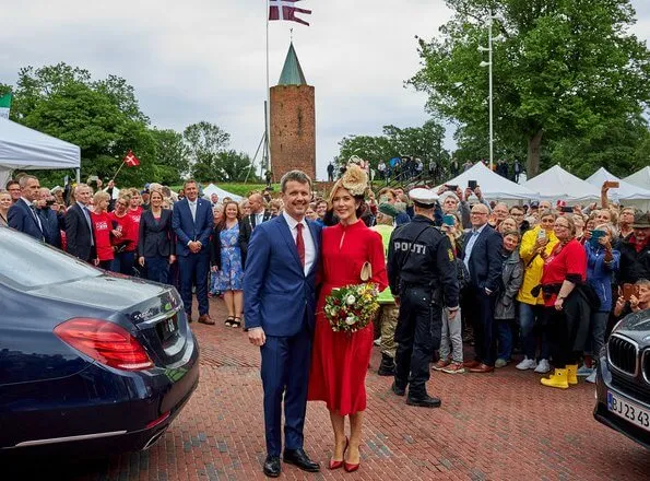 Crown Princess Mary wore Raquel Diniz Armonia silk-georgette dress. Danish flag