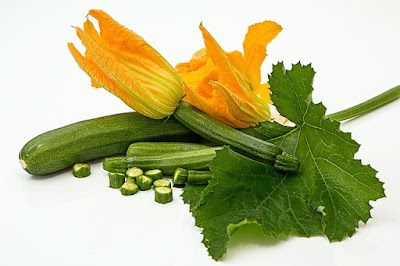 Marrow courgette yellow flowers are edible and can be stuffed with cheese edible stuffed marrow courgette flowers