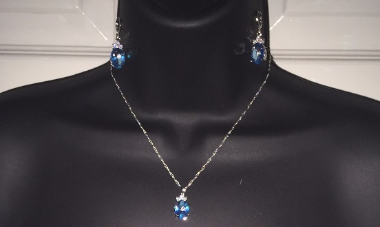 925 Silver and Floral Blue Dazzle Oval Crystal Stone Necklace and Earring Set. Chain-46cm