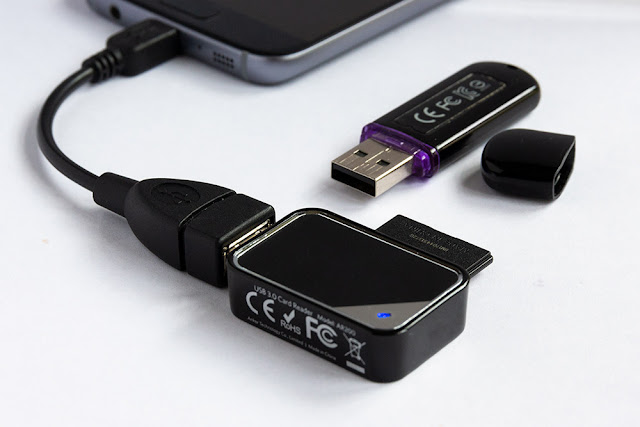 Showing an OTG cable, a USB SD card reader and a USB flash drive
