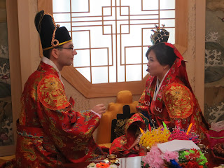 Traditional Korean wedding ceremony at wedding hall - eating dried dates