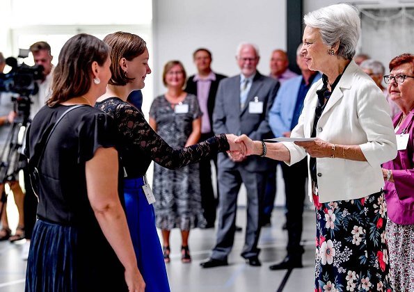 Princess Benedikte presented Nielsen Foundation's grants with a ceremony held at Nordborg Castle. floral skirt