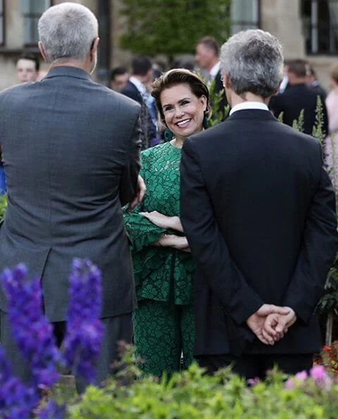Grand Duchess Maria Teresa wore a green lace top and a green wide-leg lace trouser by Carolina Herrera. Carolina Herrera Evase lace top