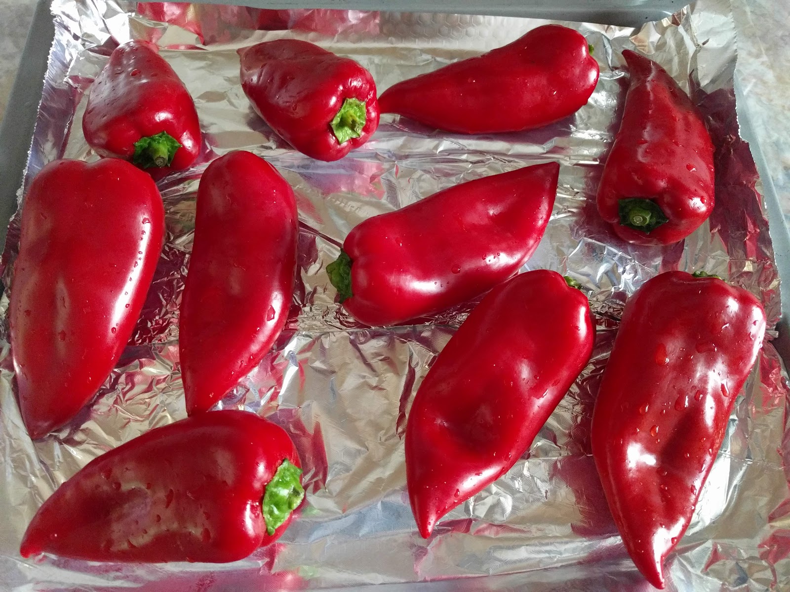 - Eingekochte Tomaten mit gegrillten Paprika