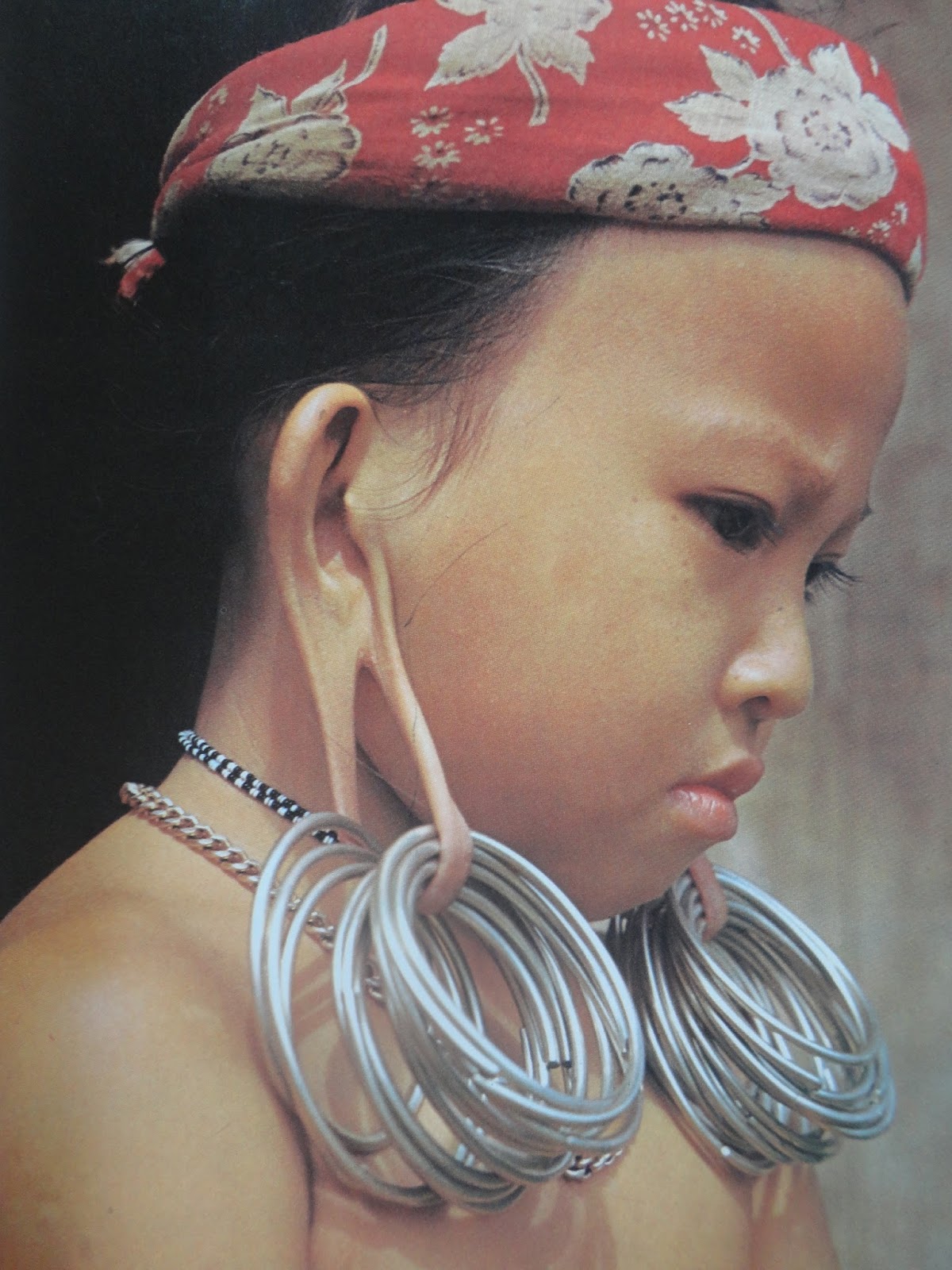 SUSTAINABLE LIVING INSTITUTE (SAVE) TRIBAL EARS PIERCED AND DANGLED