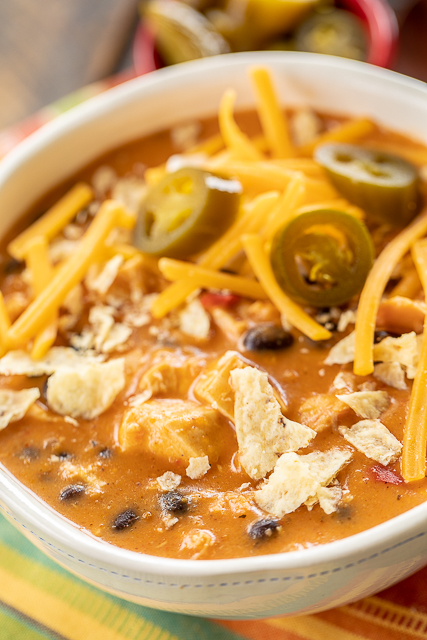 Nacho Chicken Soup - SO good and ready to eat in about 20 minutes. Use a rotisserie chicken for easy prep! Chicken, taco seasoning, nacho cheese soup, milk, black beans and diced tomatoes and green chiles. Top soup with your favorite taco toppings. We ate this twice in one week! SO good!!! #soup #chicken #mexican Nacho Chicken Soup - SO good and ready to eat in about 20 minutes. Use a rotisserie chicken for easy prep! Chicken, taco seasoning, nacho cheese soup, milk, black beans and diced tomatoes and green chiles. Top soup with your favorite taco toppings. We ate this twice in one week! SO good!!! #soup #chicken #mexican