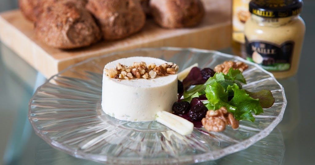 Terrine of goats' cheese and truffle mustard served with a salad and