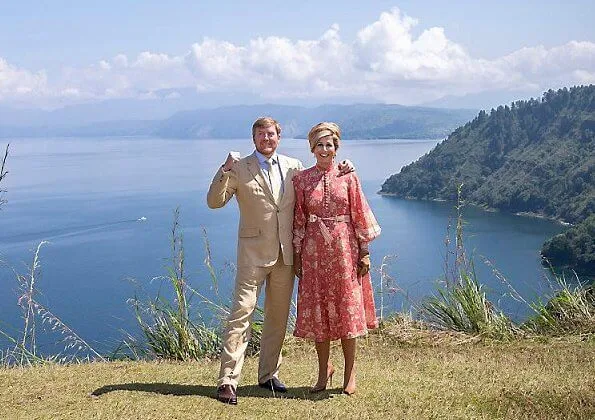 Queen Maxima wore Zimmermann Veneto border paisley print linen dress. Maxima visited a traditional Batak village and Del Institute