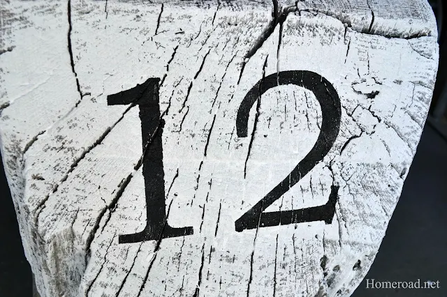 stenciled number 12 on stump