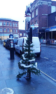 A Christmas tree on a Parking sign on St Petersgate in Stockport town centre. A Christmas tree on a Parking sign on St Petersgate in Stockport town centre.