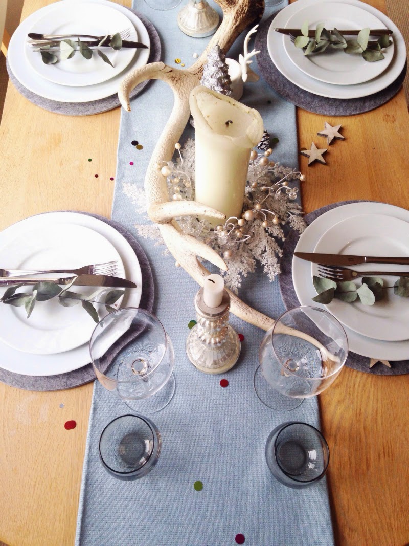 Christmas decorations on table for dinner party