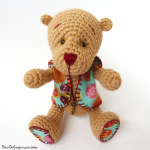 http://www.howtoamigurumi.com/amigurumi-bear-with-movable-legs-and-arms-free-pattern/