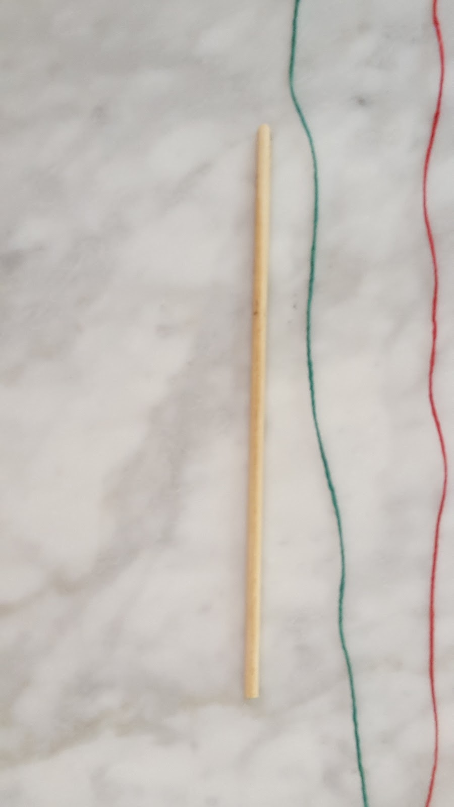 3 different colors of dental floss or some equivalent string cut into 3 foot lengths 2 a 6 8 inch wooden dowel 3 a note card with 3 holes for the strings 3 different colors of dental floss or some equivalent string cut into 3 foot lengths 2 a 6 8 inch wooden dowel 3 a note card with 3 holes for the strings