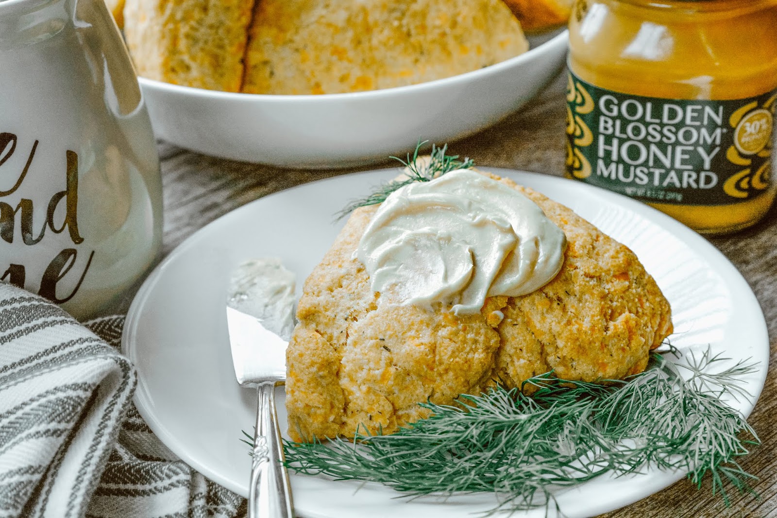 Theresa's Mixed Nuts Cheddar Cheese Scones Topped w/ Honey Mustard Butter