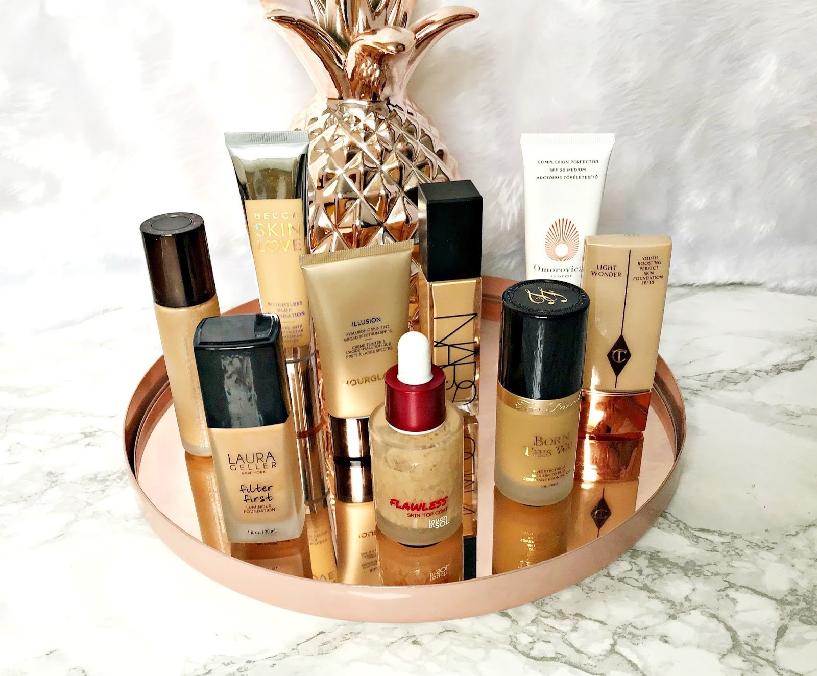 Foundations for dry skin, BECCA, Becca Aqua Luminous Perfecting Foundation, Becca Love Glow, Charlotte Tilbury Light Wonder, Dry Skin, foundation, Hourglass Illusion Hyaluronic Skin Tint, Too Faced Born This Way, Touch In Sol Top Coat, 