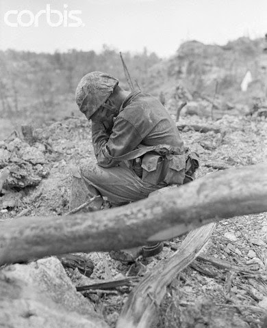 An exhausted marine on Peleliu Peleliu Palau worldwartwo.filminspector.com