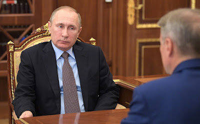 Vladimir Putin with CEO of Sberbank German Gref. Vladimir Putin, German Gref.