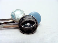 hair accessories in blues and greys made with vintage buttons