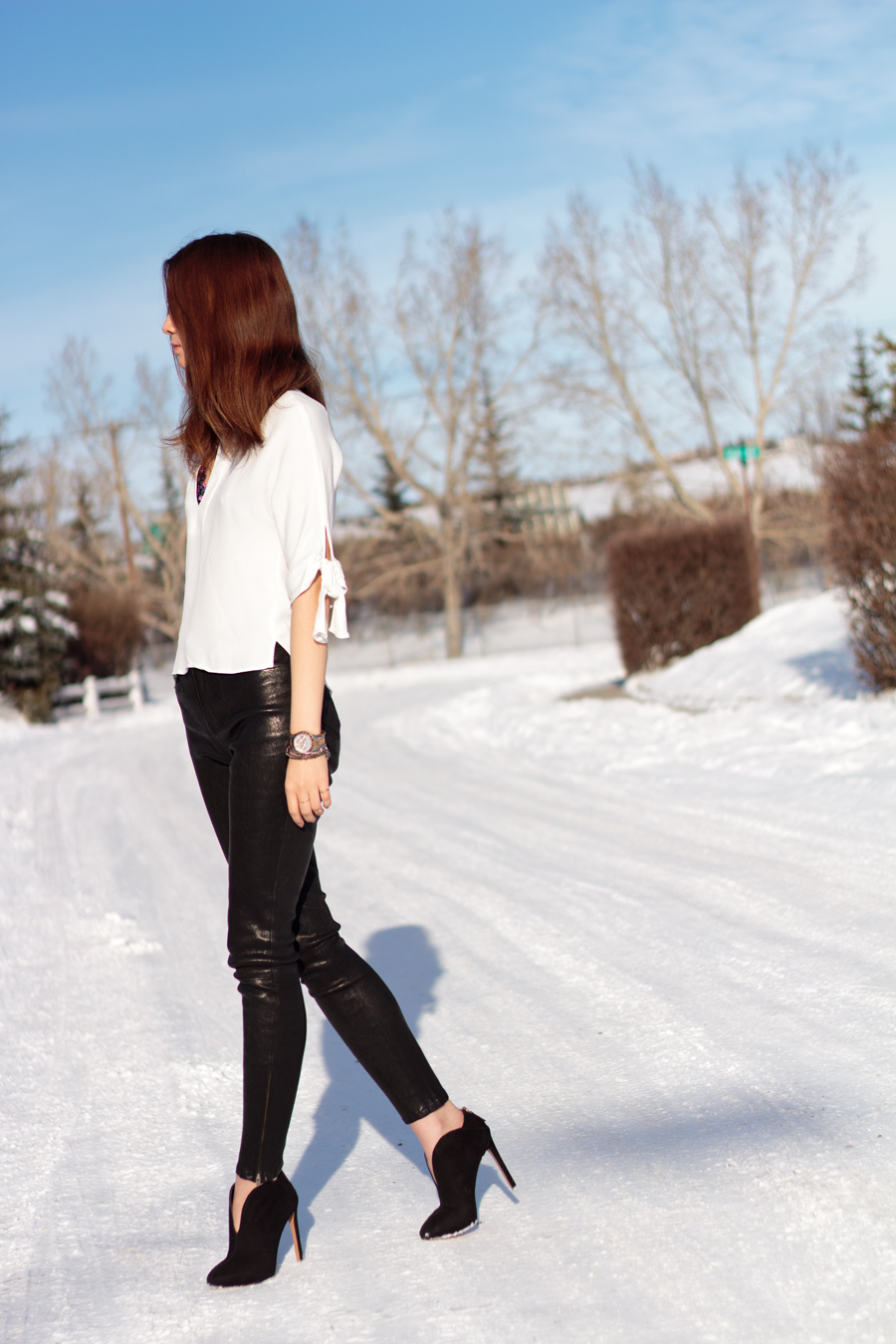 tips for buying leather pants, bow sleeved blouse, leather pants, nine west nero, michael kors watch, jbrand