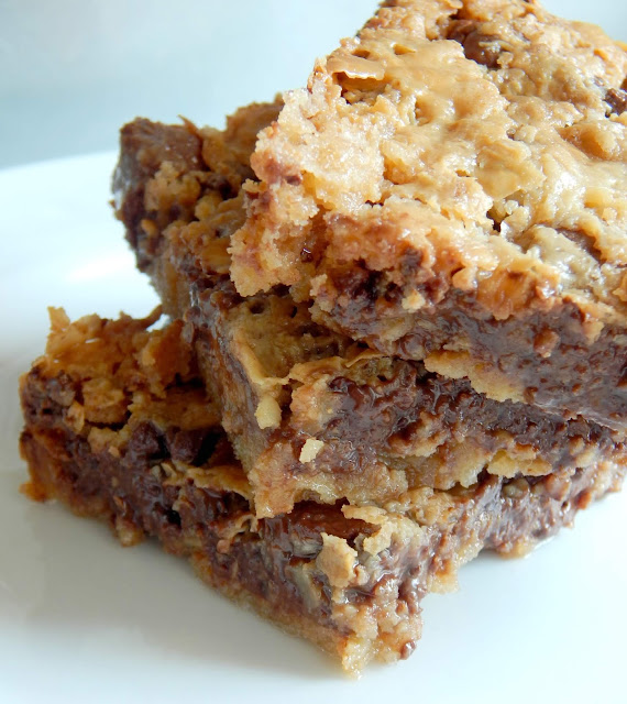 Peanut Butter Magic Bars...a chewy, sticky, buttery peanut butter and chocolate dessert bar that everyone loves!  (sweetandsavoryfood.com)