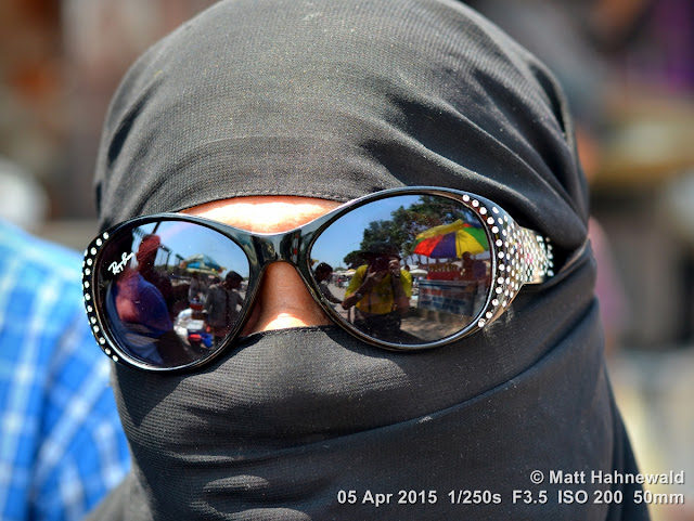 people; street portrait; headshot; face; niqab; Muslim lady; sunglasses; India; Delhi; eye contact; eyes; Nikon DSLR D3100; Nikkor AF-S 50mm f/1.8G; portrait