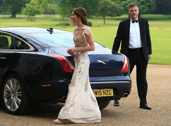 Prince William and Kate Middleton attended a gala charity dinner in support of East Anglia's Children's Hospices. Kate wore Jenny Packham gown