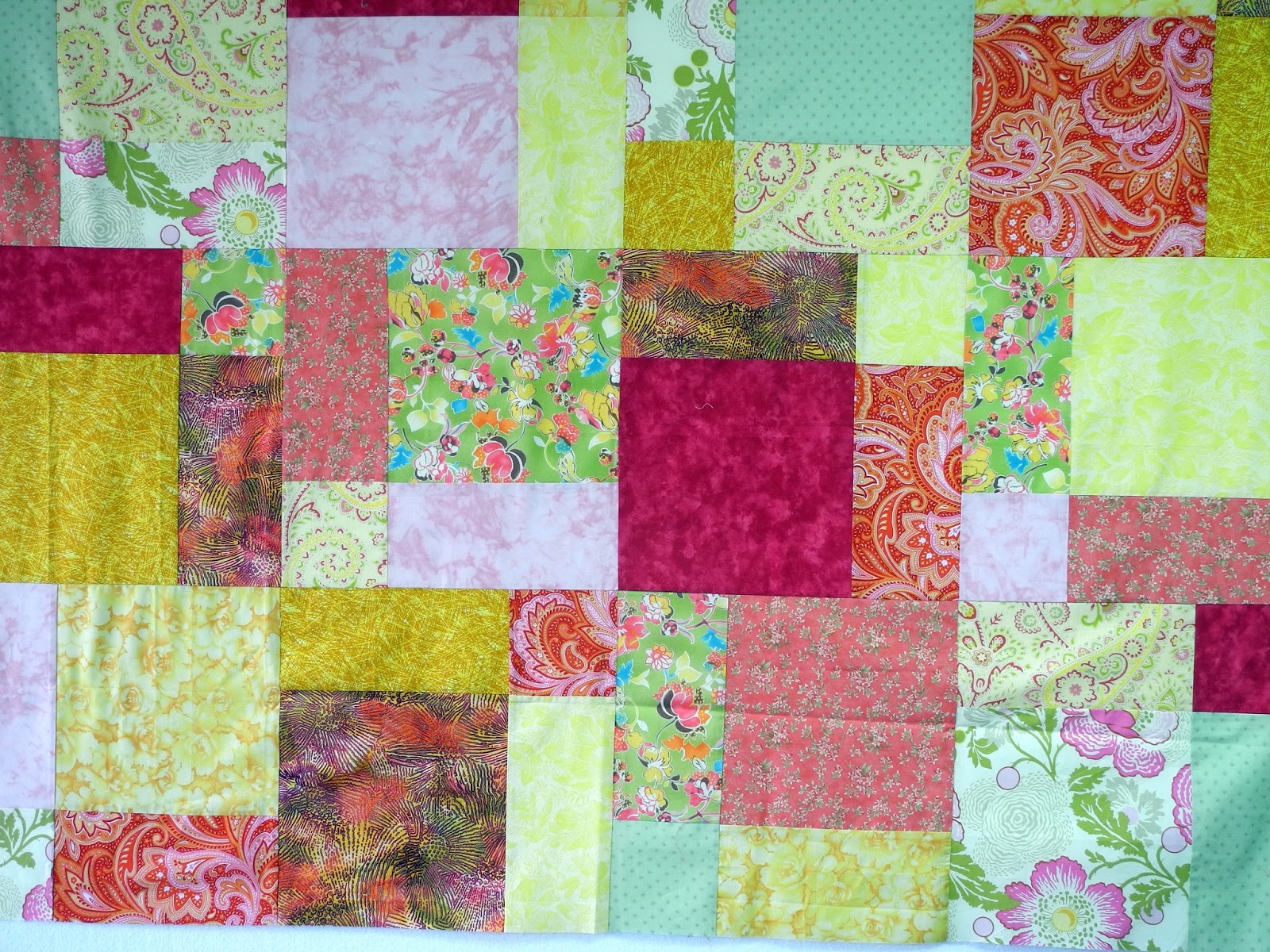Sherrie loves color! 1,500 comfort quilts completed