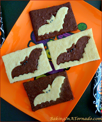 Black and White Brownie Bats, thin chocolate and white chocolate brownies decorated for Halloween. | Recipe developed by www.BakingInATornado.com | #recipe #chocolate #Halloween