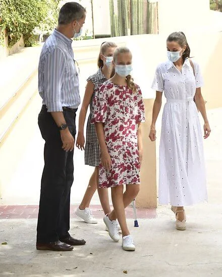 Queen Letizia wore a new floral laser-cut midi dress by Carolina Herrera. Princess Leonor wore a wide-fit printed dress by Sfera