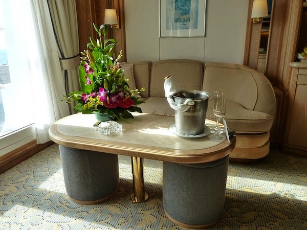 Coffee table with boxes of fruit