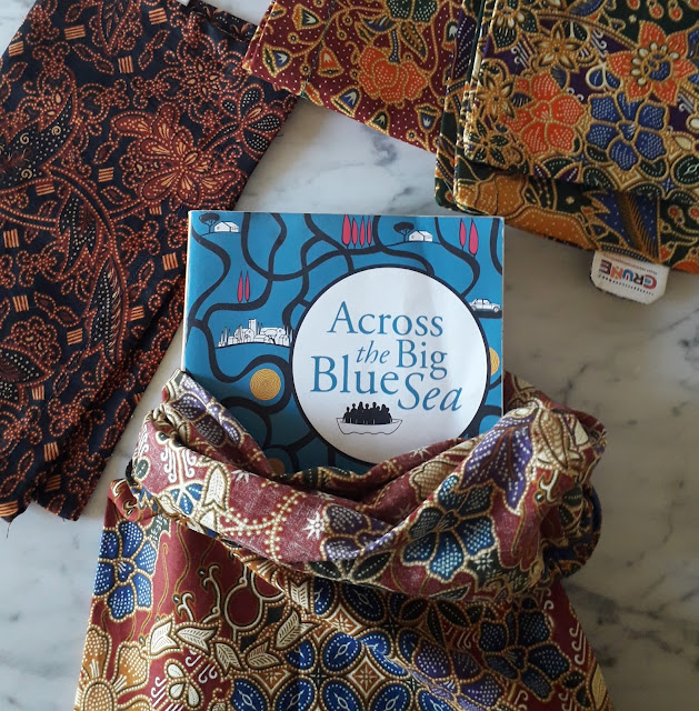'Across the Big Blue Sea' & the book satchels made by the Crunelab refugee project