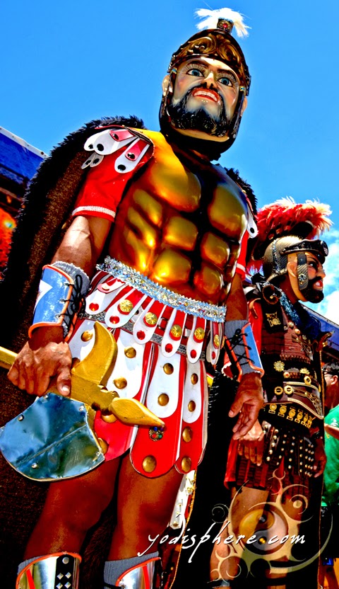 Moriones wearing colorful wooden mask and thick body costume 