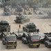 Turkey deploys tanks and heavy weapons on Syrian border
