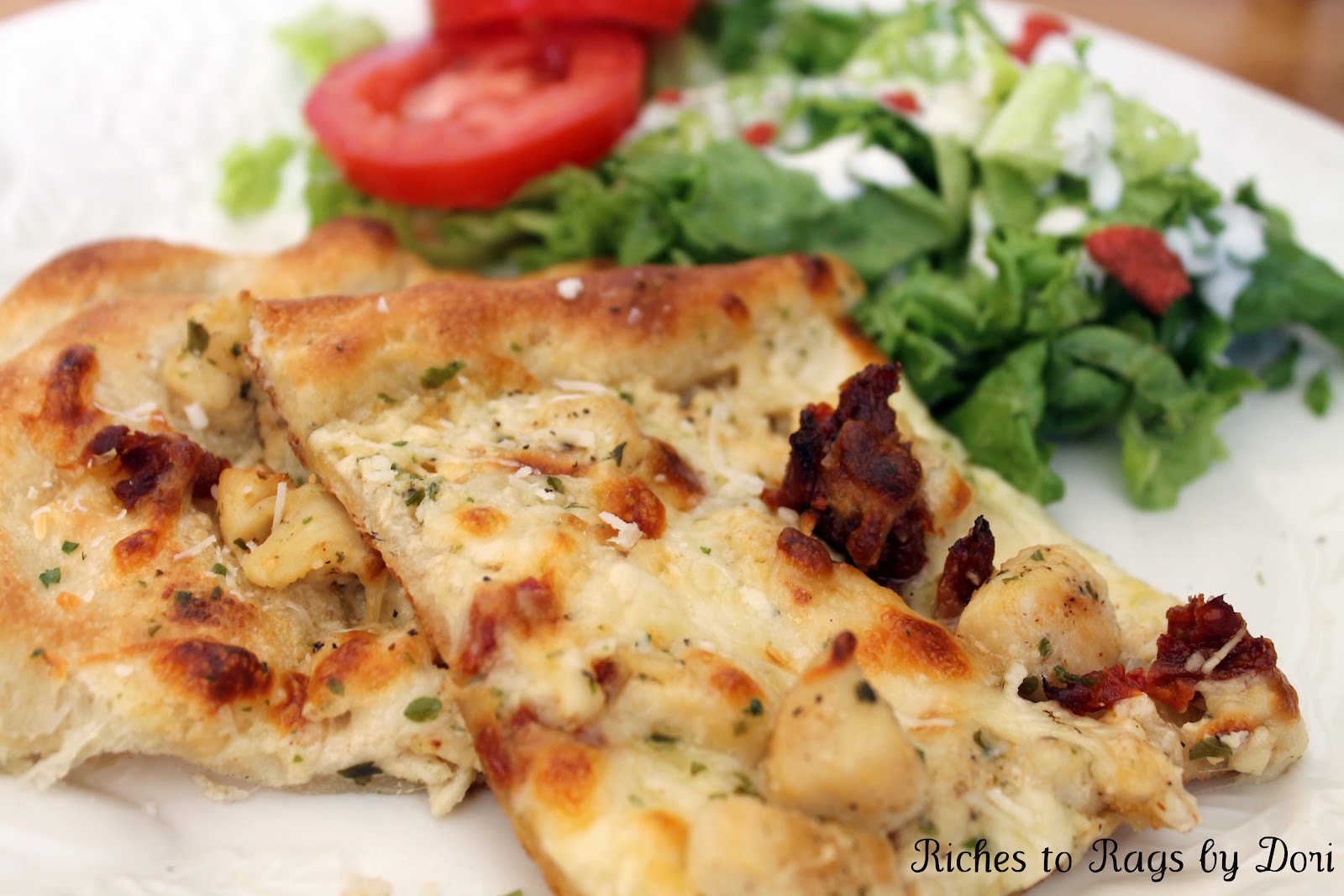 *Riches to Rags* by Dori Chicken Alfredo Ranch Pizza