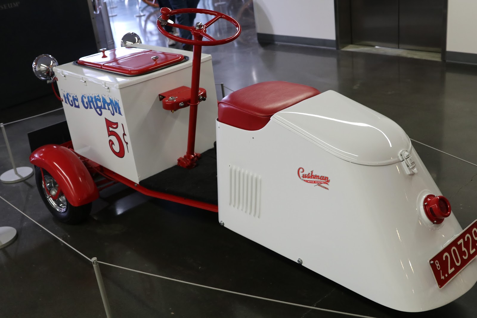 OldMotoDude 1956 Cushman Ice Cream Scooter on display at LeMay America's Car Museum