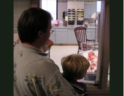 Dad and son looking at newborn, by Ned Horton (Horton Web Design - http://www.HortonGroup.com) on freeimages.com Image: Dad and son looking at newborn, by Ned Horton (Horton Web Design - http://www.HortonGroup.com) on freeimages.com
