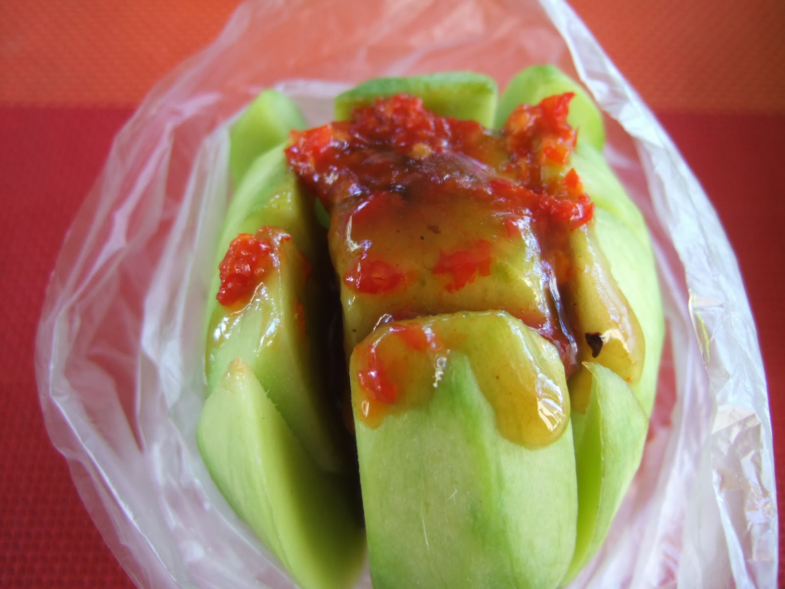 Potagers en liberté à l'île Maurice! Un fruit de saison (mangue) = Une