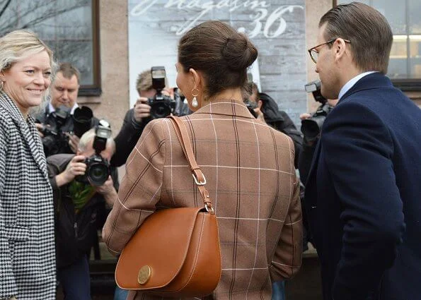 Crown Princess Victoria wore Acne Studios wool and cotton-blend suit, and Cravingfor Jewellery baroque pearl earrings