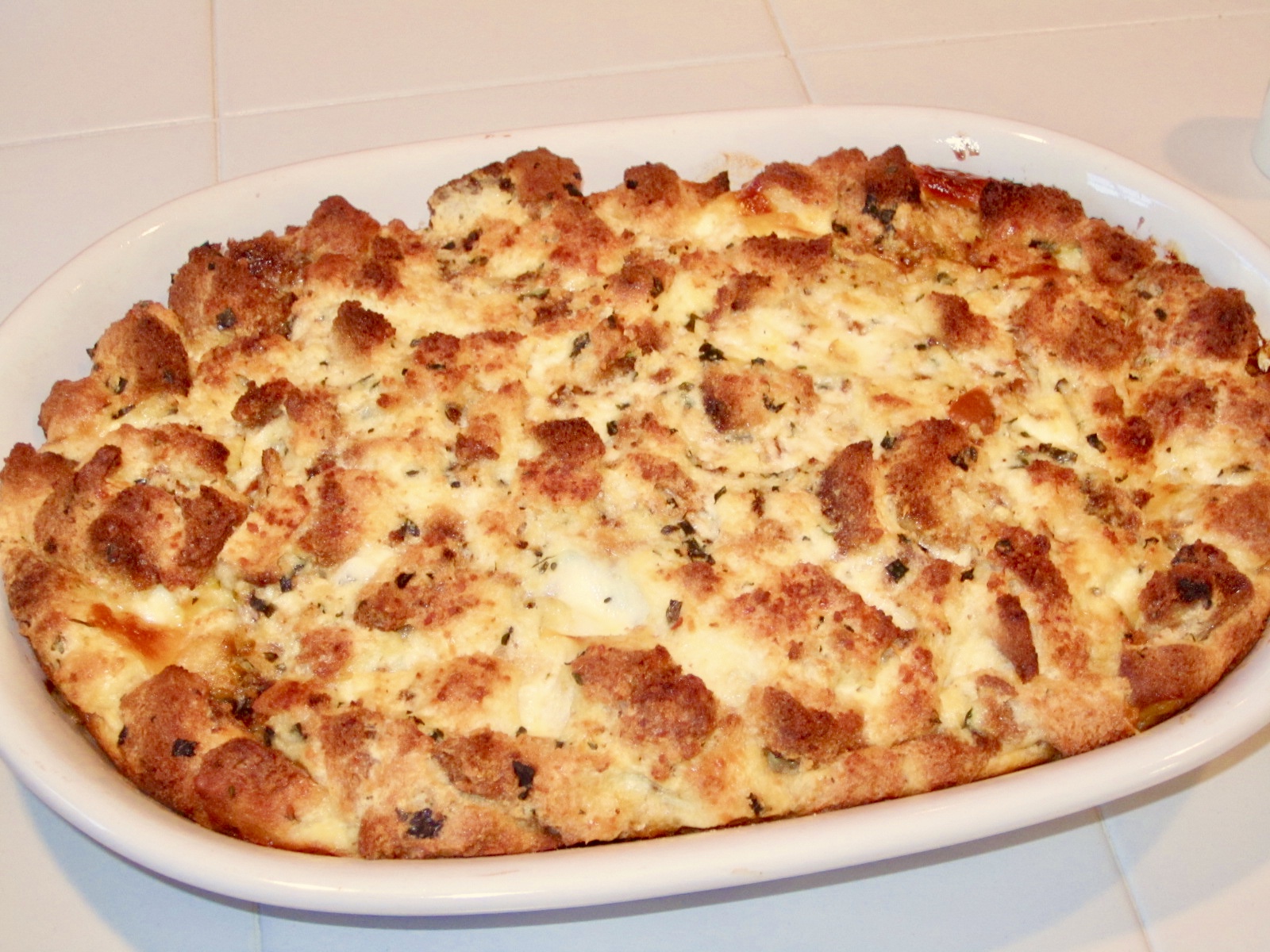 Savory Bread Pudding with Heirloom Tomatoes, Herbs and Mozzarella
