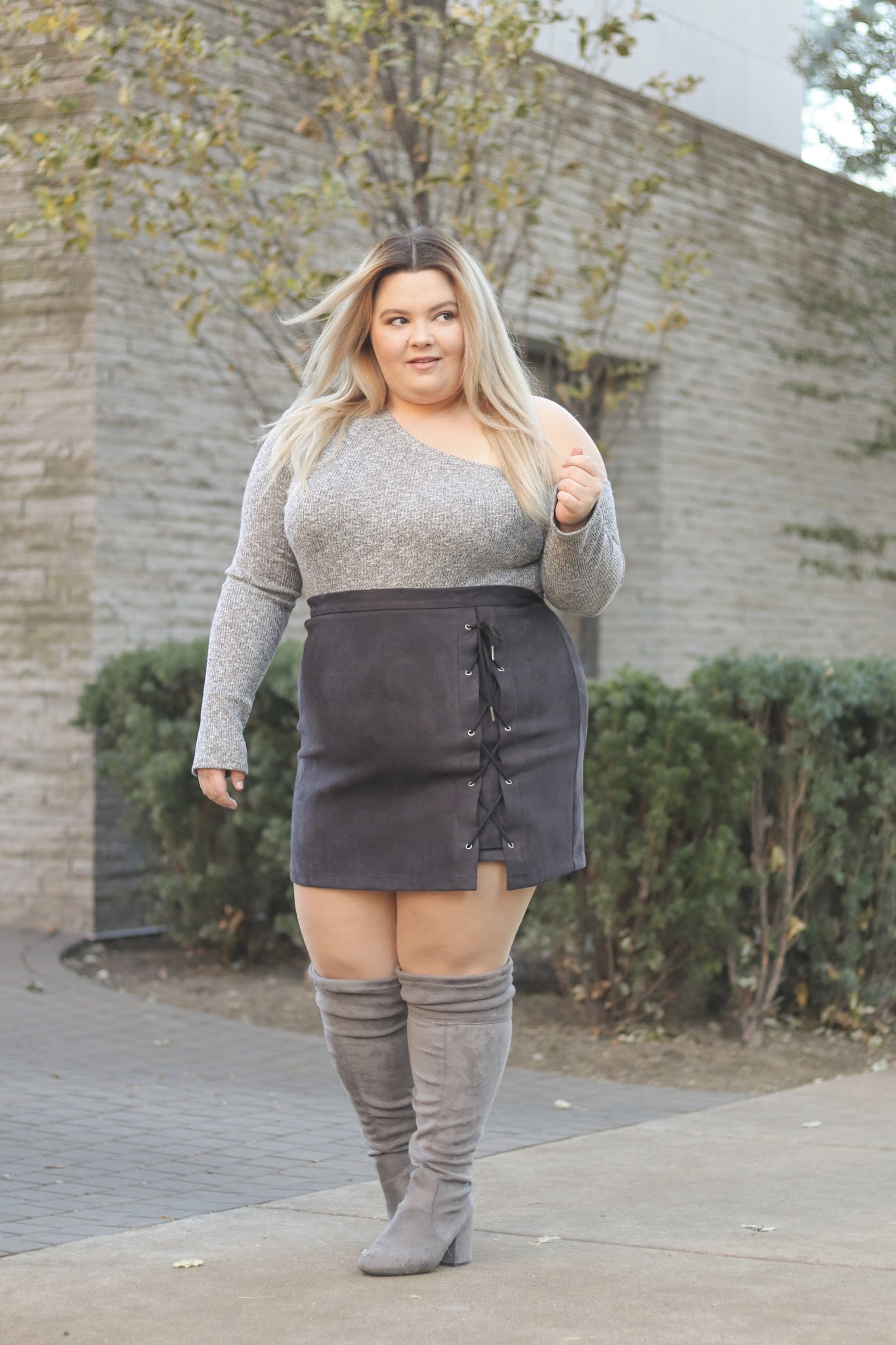 Chicago Plus Size Fashion Blogger Natalie Craig reviews gray suede over the knee boots.