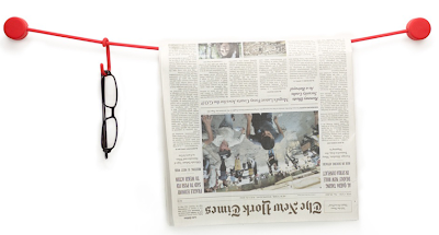 wall-mounted line with hooks - holds eyeglasses, newspaper, etc.